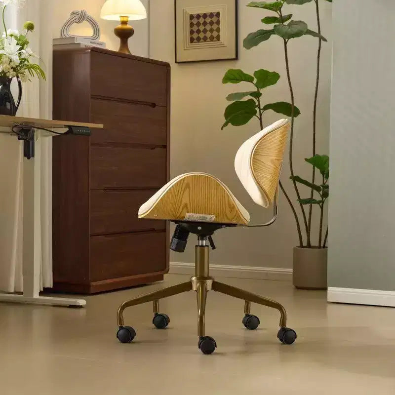 Karl Home | Chaise de bureau courbée en PU avec piètement bronze antique
