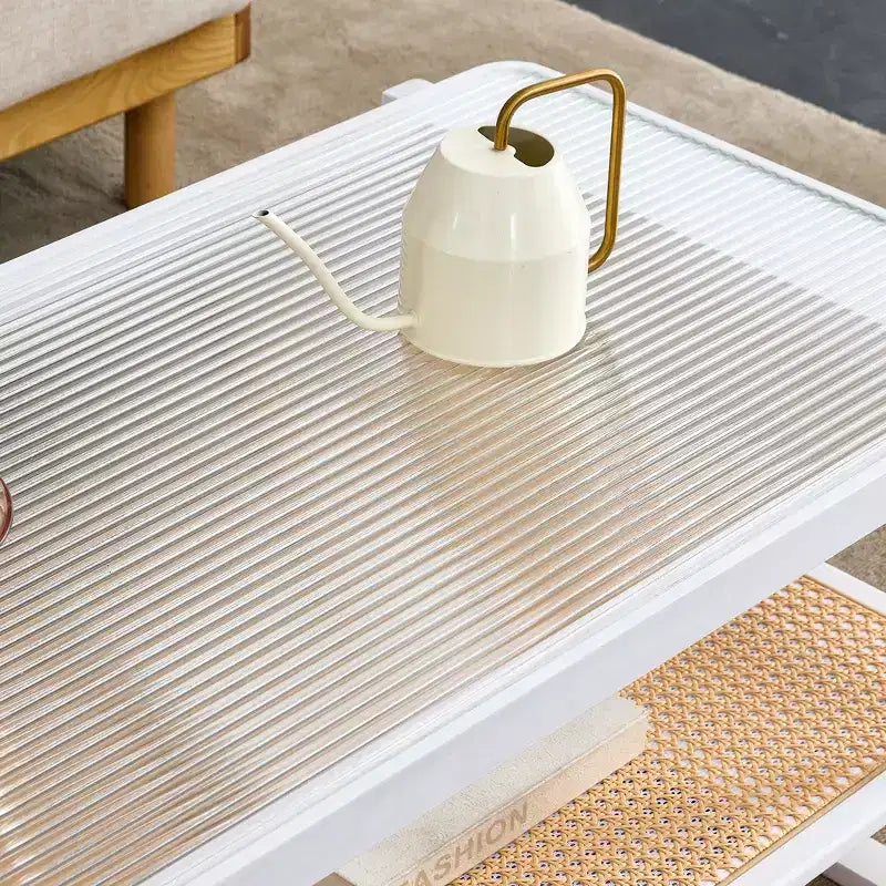 Table basse à deux niveaux en bois avec plateau en verre et bordure style rotin, pour salon ou chambre à coucher