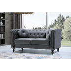 Causeuse Chesterfield classique en velours et clous décoratifs