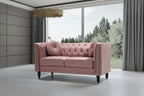 Causeuse Chesterfield classique en velours et clous décoratifs